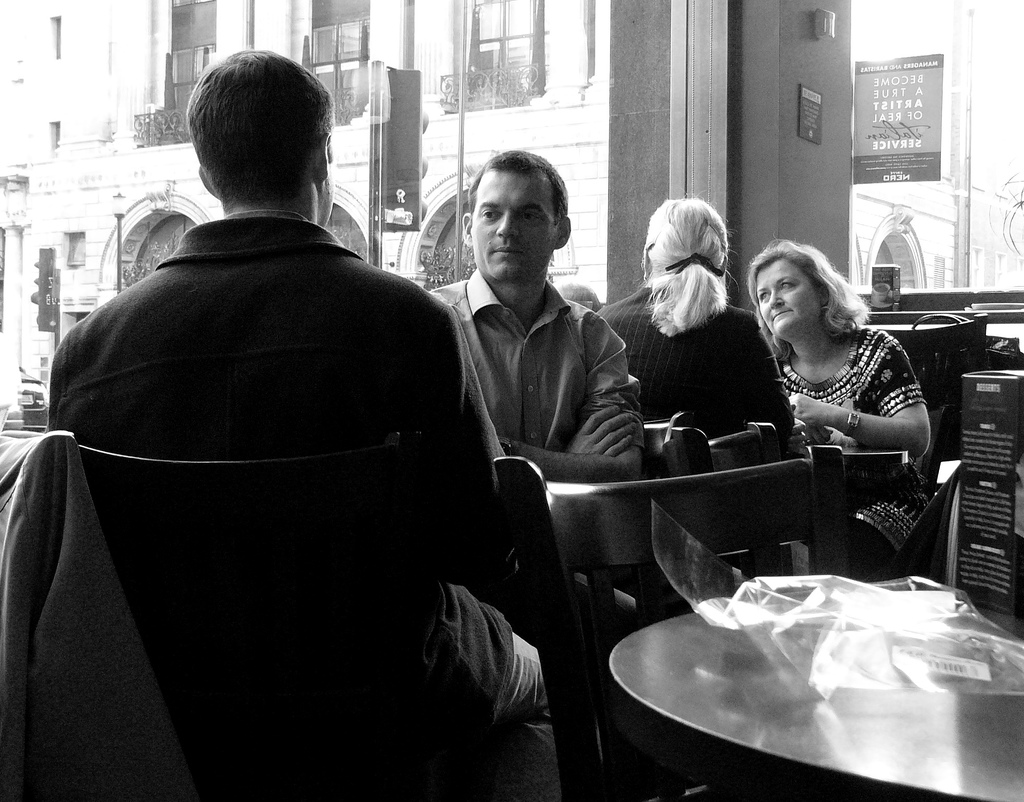 Discussing in a Coffe Shop