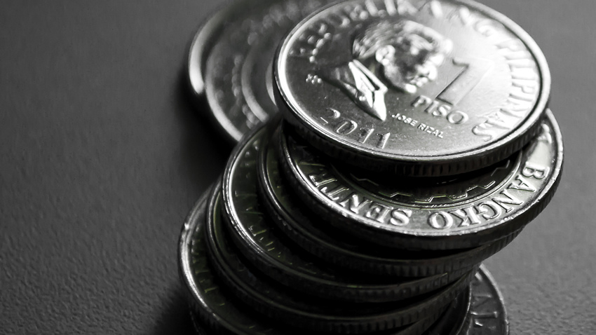 A stack of 1 peso coins