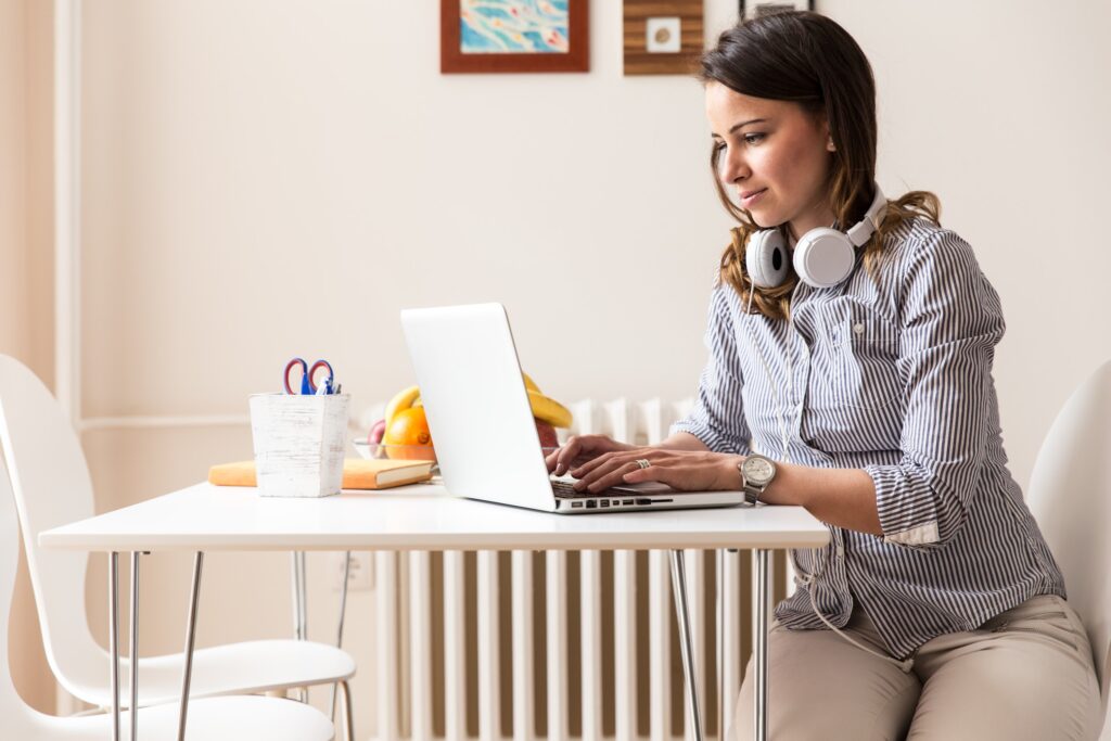 An online customer reading in her laptop