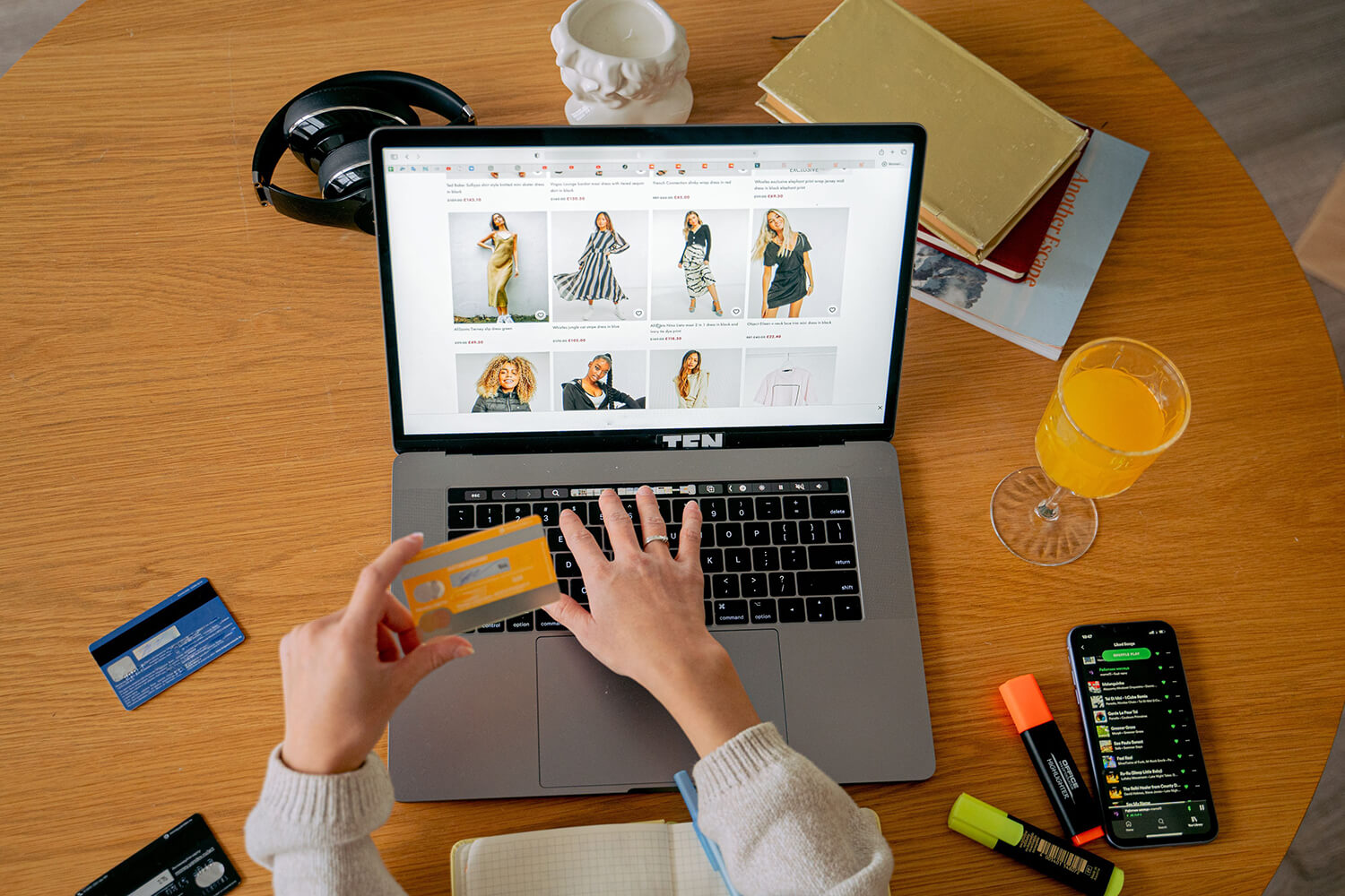 Overhead view of a person making a purchase on an e-Commerce website.