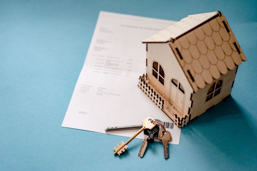 small model house with keys