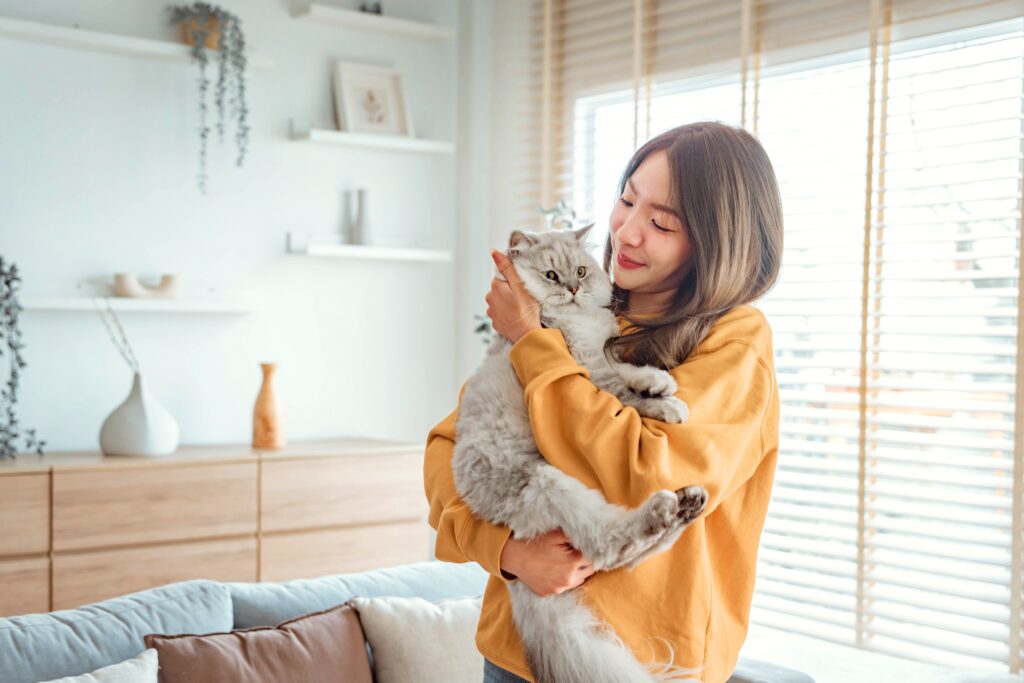 woman with her pet cat