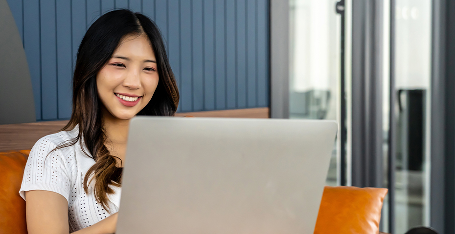 a woman using a laptop