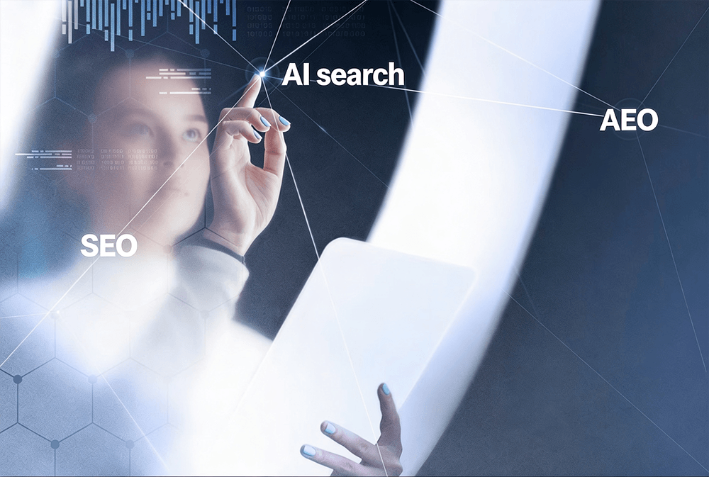 Woman tapping into AI Search, SEO, and AEO